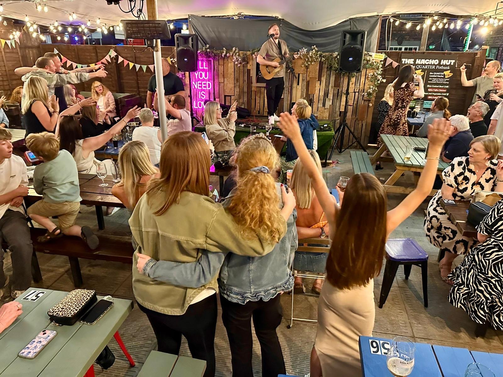 Guests enjoying live music at an event